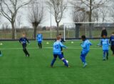 S.K.N.W.K. JO10-1 - FC De Westhoek '20 JO10-2 (competitie) seizoen 2021-2022 (voorjaar - 3e fase)) (6/97)